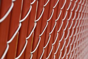 How to Make a Chain Link Fence Less Conspicuous 