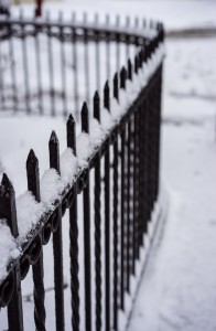 fence with snow on it
