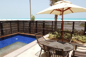 Swimming pool near beach of the luxury hotel, Saadiyat island